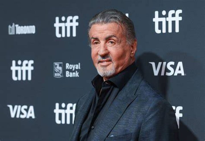 Sylvester Stallone talking a stroll with Chuck Zito and his brother
